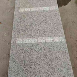 汉中芝麻白光面毛板